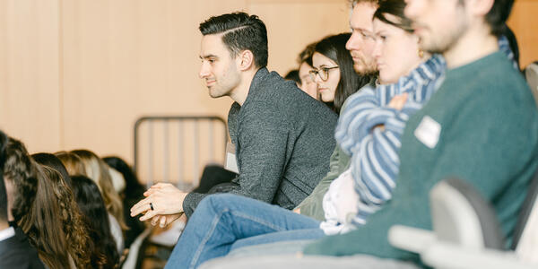 PBSC volunteer listening intently to a presentation.